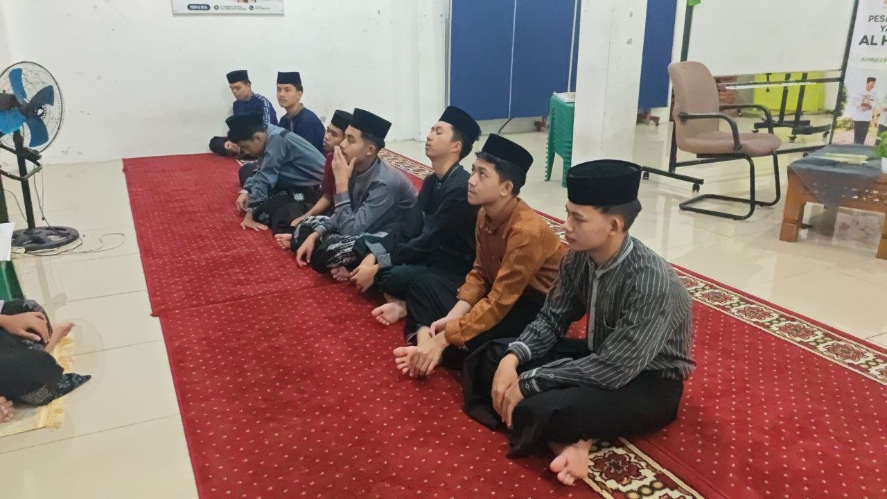A group of men sitting on a red carpet

AI-generated content may be incorrect.
