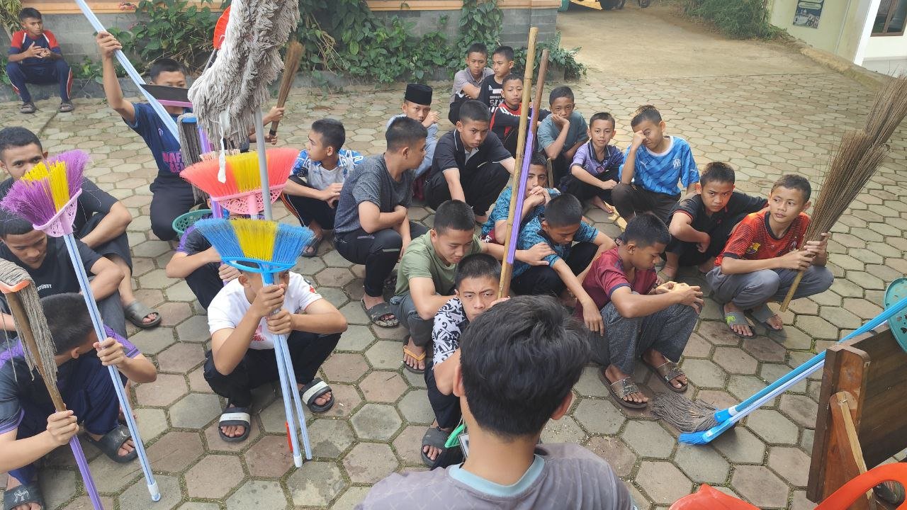 A group of people sitting on a brick floor

AI-generated content may be incorrect.