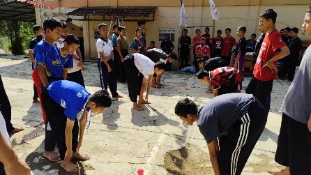 A group of people standing around a circle AI-generated content may be incorrect.