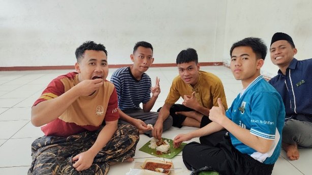 A group of young men sitting on the floor eating food AI-generated content may be incorrect.