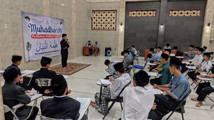 A group of people sitting in chairs in a room AI-generated content may be incorrect.