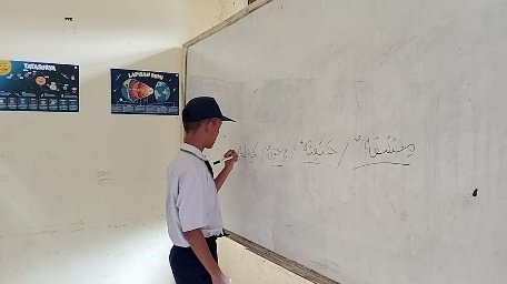 A person writing on a whiteboard AI-generated content may be incorrect.